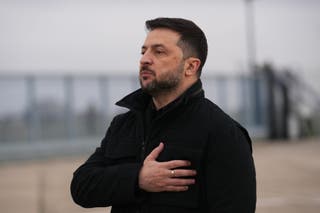 Zelenskyy listens his national anthem upon his arrival